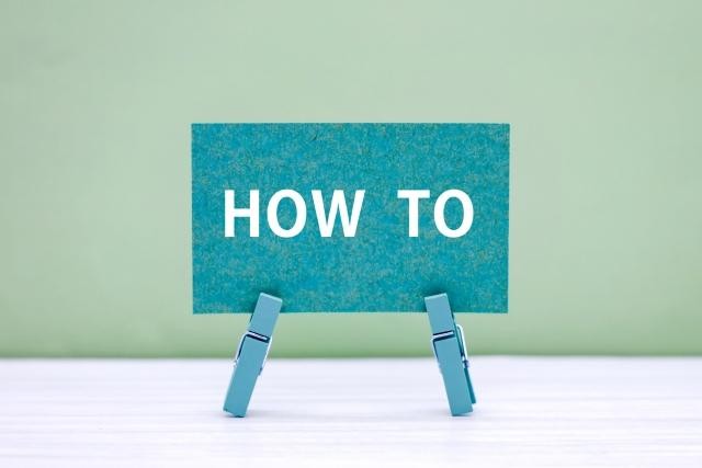 HOW TOの文字とクリップ